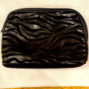 BLACK METALLIC HUED AND TEXTURED ANIMAL PATTERN TOILETRIES CASE WITH ZIPPER